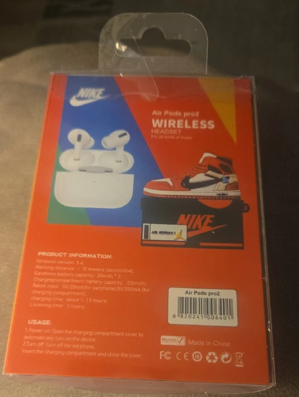 Nike Red and Black Wireless Earbuds with Sneaker-Themed Case